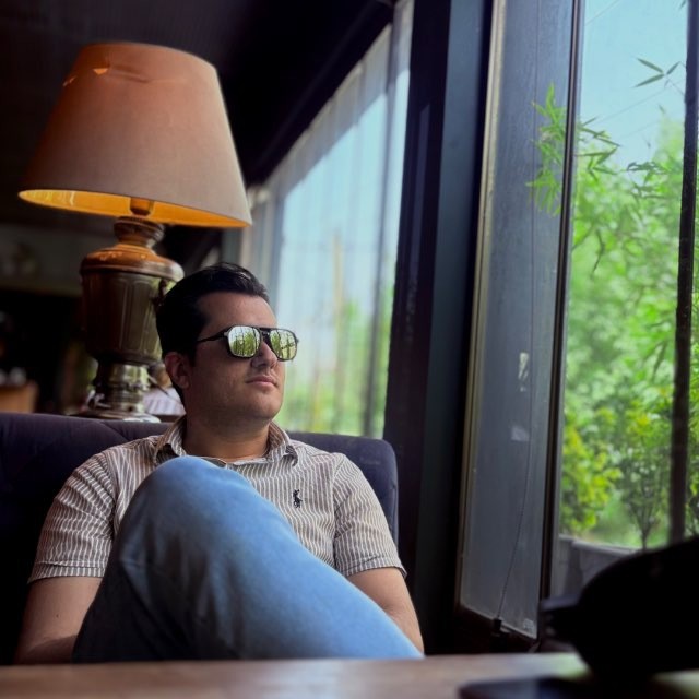 Abolfazl's image in a cozy cafe